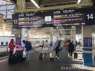 People coming to the station in Hiroshima, Japan Editorial Stock Photo